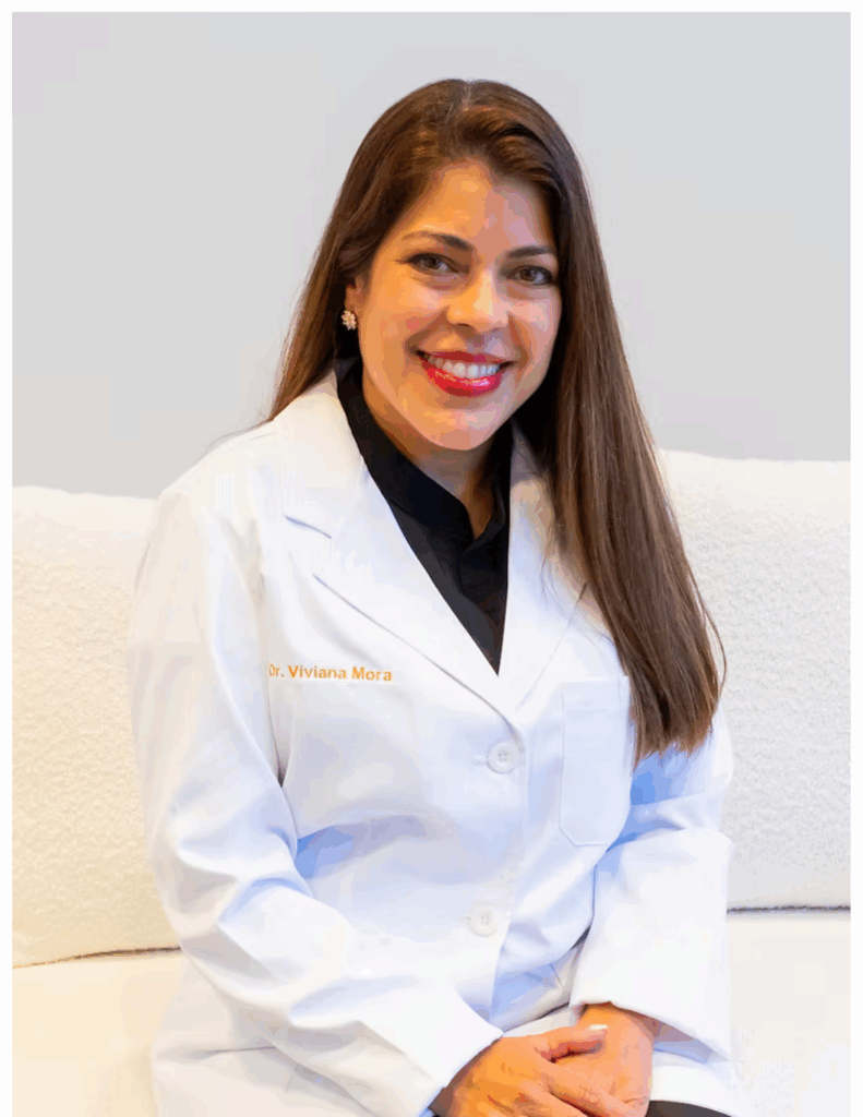Dr. Viviana Mora smiling in her office at Mora Dental Studio in Brandon, FL